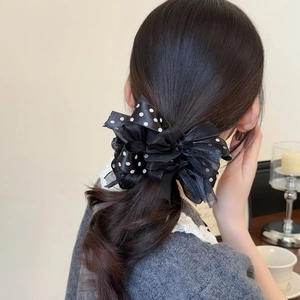 Elegant black polka dot bow hair scrunchie with layered mesh for stylish women's updos