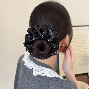 Classic black and white polka dot oversized scrunchie for hair styling and accessories