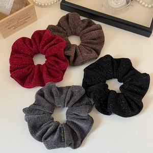 Elegant 4-piece set of shimmering knit fabric scrunchies in burgundy, brown, black, and gray