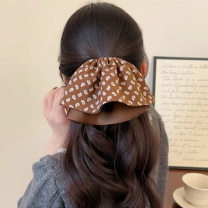 Elegant large brown paisley print double layer bow hair claw clip for women back view