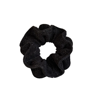 Elegant black knit scrunchie with silver glitter thread for high ponytail hairstyles