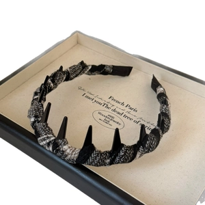 Fashionable tweed headband with black spike accents and non-slip teeth for women