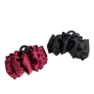 Elegant satin puff ribbon hair claw clips in classic black and dark red colors