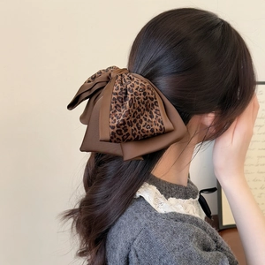 Elegant leopard print and brown satin ribbon bow hair claw clip for French style hairstyle