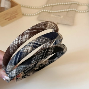 Three-piece set of preppy plaid fabric headbands in brown blue and black vintage patterns