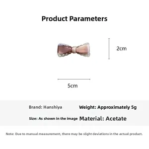 Detail view of 5cm hollow bow hair clip in acetate with size and weight parameters