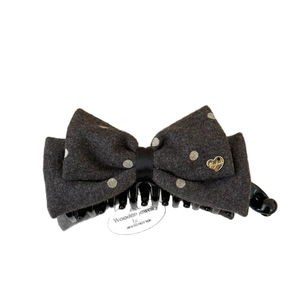 Elegant dark grey polka dot bow banana hair clip with golden heart detail