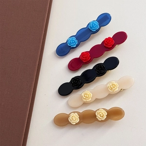 Elegant wavy acetate hair clips with 3D rose floral design in five assorted colors
