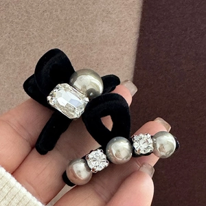Elegant black velvet bow hair clip with crystal and silver pearl detail for women