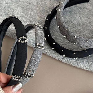 Elegant beaded headband set with sparkling rhinestones in grey and black fabrics