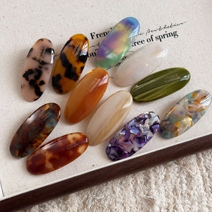 Vintage oval acetate hair clips in various colors with France handmade golden label