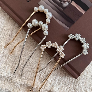 Elegant U-shaped hair pins with white faux pearls and gold metal finish for buns