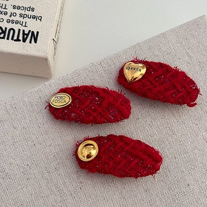 Three-piece set of red tweed hair clips with vintage golden heart and oval metal buckles
