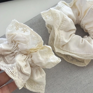 Lace ruffle hair scrunchies in milky white with delicate floral embroidery and pleats