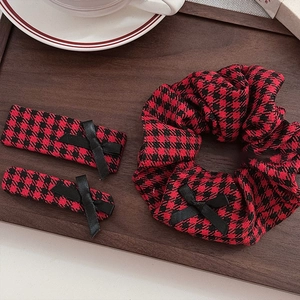 Vintage red houndstooth hair accessory set featuring a scrunchie and two bow hair clips