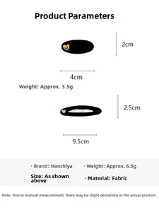 Detailed size specifications for black fabric hair clips with gold heart accents