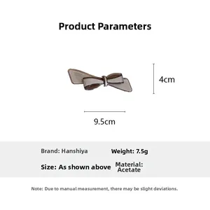 Détails de la pince à cheveux noeud en acétate mesurant 9,5 cm de long et 4 cm de large