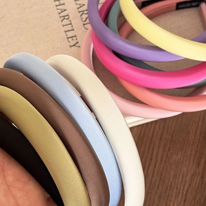 Minimalist thick satin padded headbands in assorted vibrant colors for women