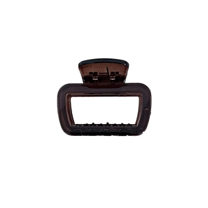 Minimalist amber brown translucent rectangle hair claw clip on white background