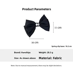 Detail view of large black bow hair clip with rhinestone pearl center and sizing dimensions