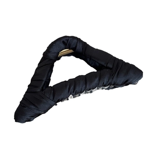 Elegant black fabric wrapped triangular shark hair claw clip with minimalist design