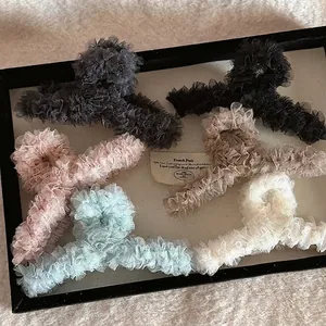 Elegant French style lace mesh hair claw clips set in five colors on plush background