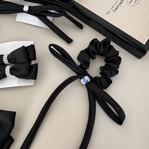 Elegant black satin bow hair accessory set with sparkling rhinestone and pearl accents
