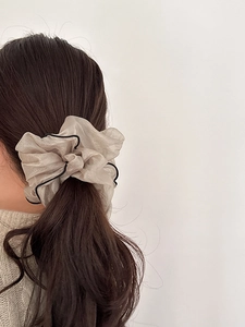 Elegant champagne gold organza scrunchie with black piping for ponytail hairstyle