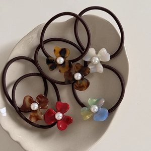 French vintage acetate flower hair ties set with pearls and tortoiseshell pattern