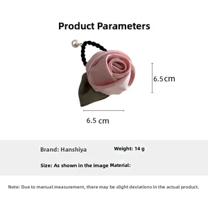 Détail des paramètres du chouchou rose en tissu 3D avec un diamètre de 6,5 cm
