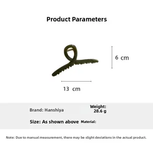 Detail view of a large 13cm dark green matte hair claw clip showing size and weight specifications
