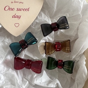 Elegant 5-piece bow-knot hair clip set in vintage resin colors with handmade engravings
