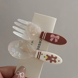 Cute set of brown fork and white spoon hair clips with bear and bow patterns