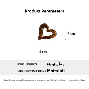 Braune Haarklammer in Herzform mit Schildpattmuster Maße 6cm mal 5cm und 30g Gewicht