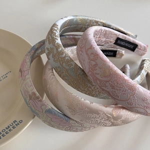 Stack of vintage Chinese jacquard padded headbands with elegant floral embroidery