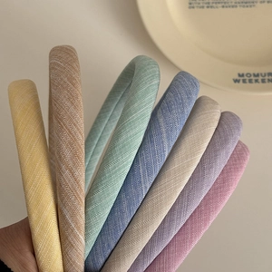Set of 8 solid color twill fabric sponge headbands in various soft pastel colors