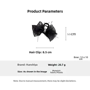 Detail view of black mesh bow hair claw clip with rhinestones and size dimensions
