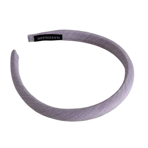 Minimalist lavender fabric sponge headband with handmade label and twill texture