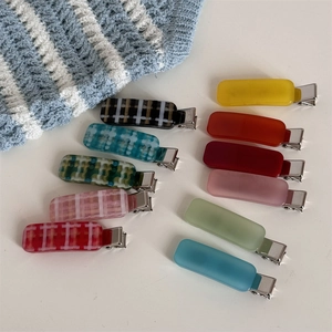 Set of 11 colorful acetate rectangular hair clips in solid colors and checkered patterns