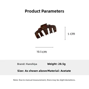 Detail view of large acetate hair claw clip with 10.5cm size and tortoise pattern
