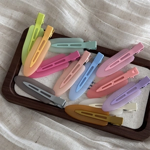 Set of 12 matte colorful jelly finish hair clips and seamless makeup clips for styling