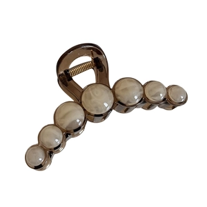 Elegant large amber hair claw clip with cream bead embellishments for women