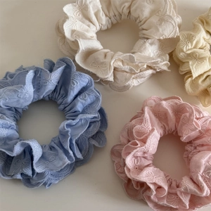 Chouchous pastels avec broderies de nœuds en bleu, blanc, rose et jaune pour femme