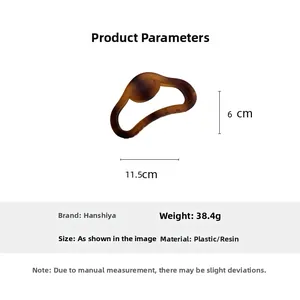 Detailed view of matte amber hair claw clip with dimensions 11.5cm by 6cm