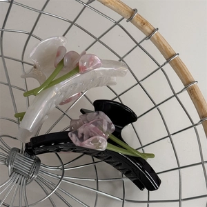 Elegant acetate tulip flower hair claws in white and black for thick hair styling