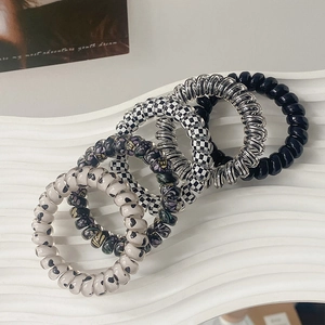 Set of 5 stylish spiral hair ties with checkered and heart patterns in high-quality resin