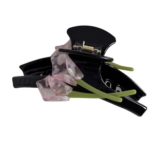Elegant black acetate hair claw clip with pink tulip flower design for women