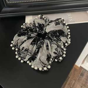 Elegant off-white organza scrunchie with black floral embroidery and pearl edge detail