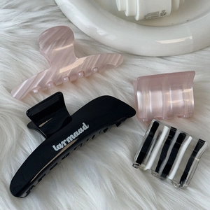 4-piece acetic acid hair claw clip set in pink and black marble patterns for women