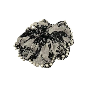 Elegant black floral lace scrunchie with white pearl trim and French vintage style